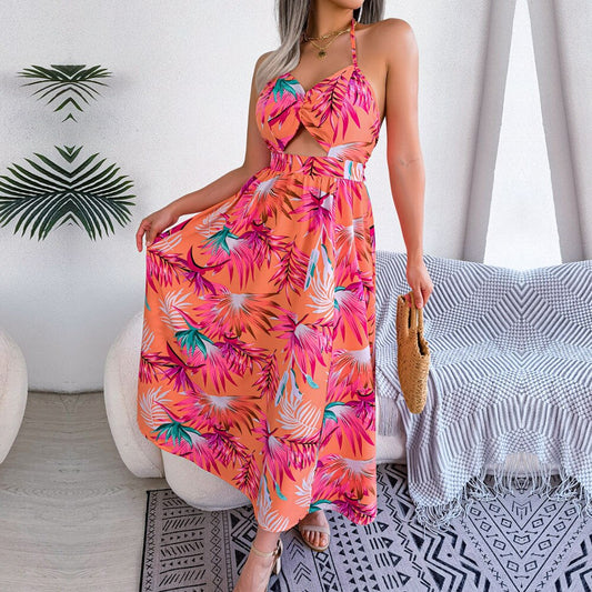 Eloise – Orangefarbenes Neckholderkleid mit Blumenmuster und Cut-outs