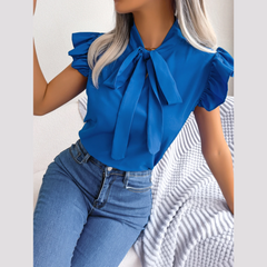 Britney - Tople de mangas de tapa de tapa de volante azul