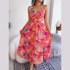 Eloise – Orangefarbenes Neckholderkleid mit Blumenmuster und Cut-outs