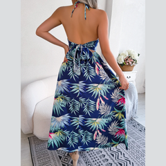 Eloise – Blaues Neckholderkleid mit Blumenmuster und Cut-outs